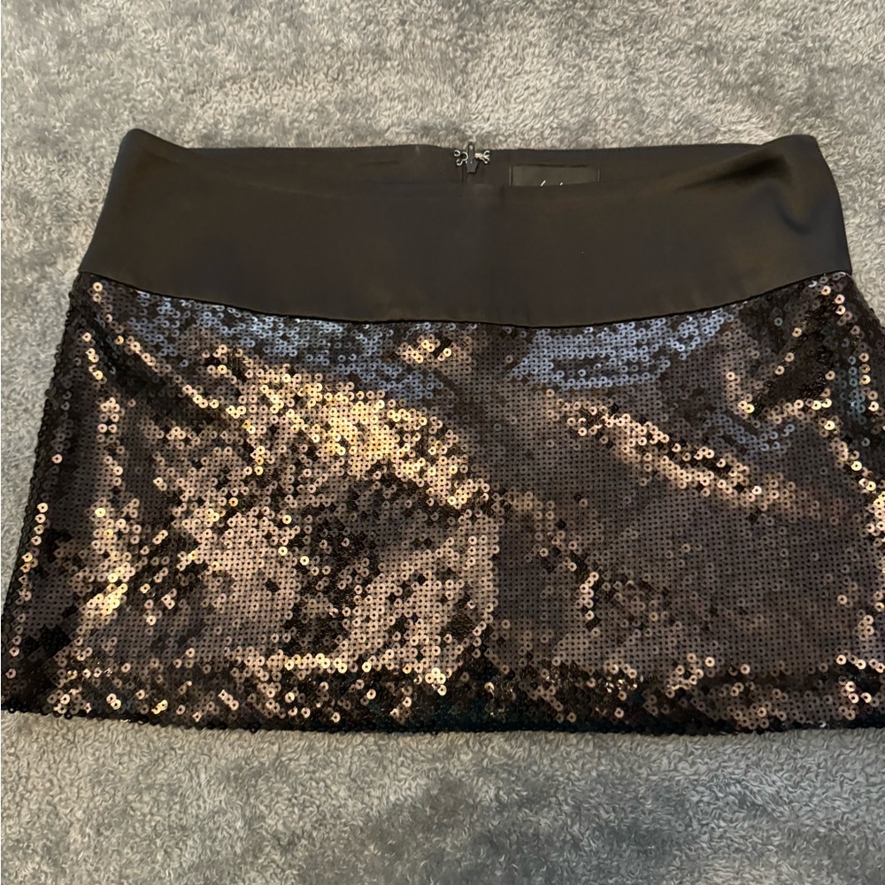 Black sequin mini skirt